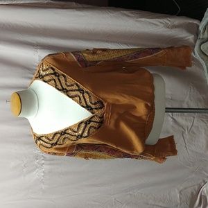 Free people, size small blouse. With elastic waist band.